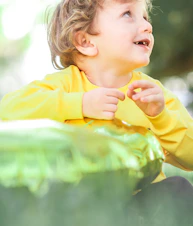 girl in yellow long sleeve shirt